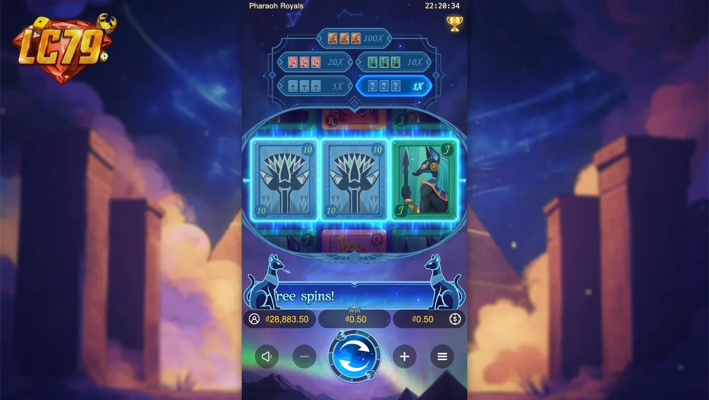 Màn hình Free Spins Pharaoh Royals nền xanh với linh miêu Ai Cập hai bên lưới